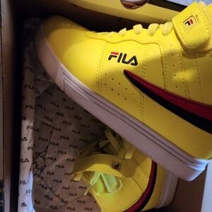 Great condition in a box. Fila sneaker. Just the right bright color for summer